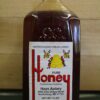 Plastic bottle of pure wildflower honey