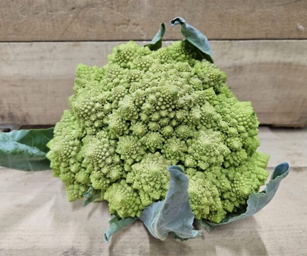 Romanesco cauliflower on wooden surface