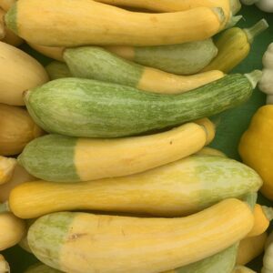 Pile of yellow and green summer squashes