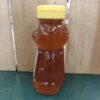 Bear-shaped honey bottle with yellow cap