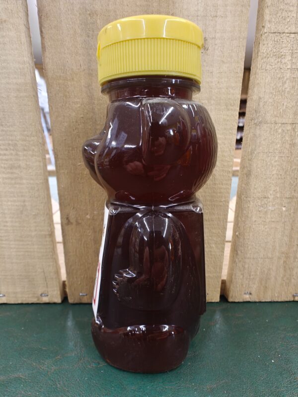 bear-shaped honey bottle with yellow cap