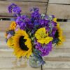 20260628_094601 Sunflower and purple bouquet in glass vase