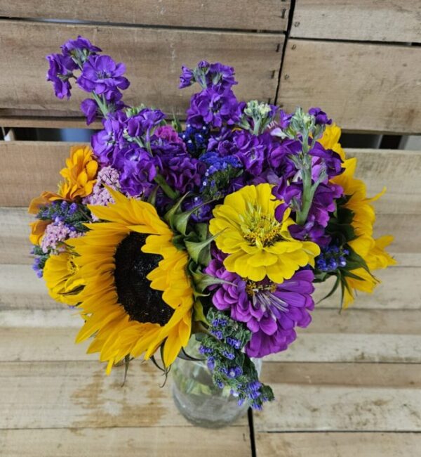 20260628_094601 Sunflower and purple bouquet in glass vase