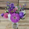 20260628_094744 Purple and pink floral bouquet in glass jar